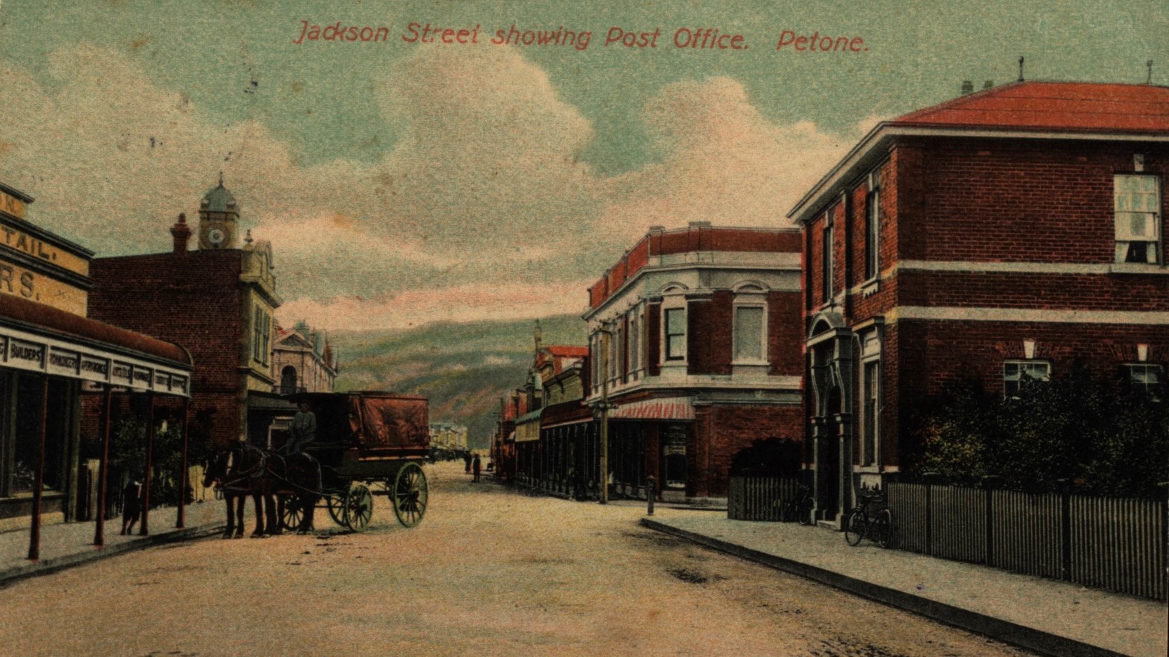 A historic colourised image of Jackson Street showing the post office